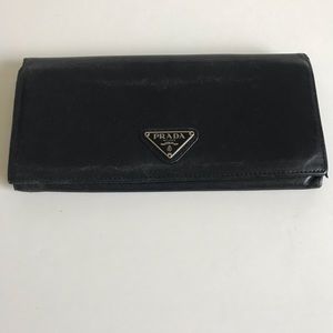 Prada, black calfskin leather wallet